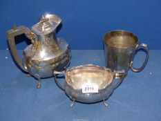 A small quantity of plated items to include; Walker & Hall hot water jug, sugar basin, tankard, etc.