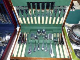 A six person canteen of cutlery including dinner knives and forks and fish knives and forks,