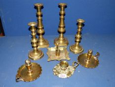 Two pairs of brass candlesticks, pair of brass chamber sticks, other chamber sticks, etc.