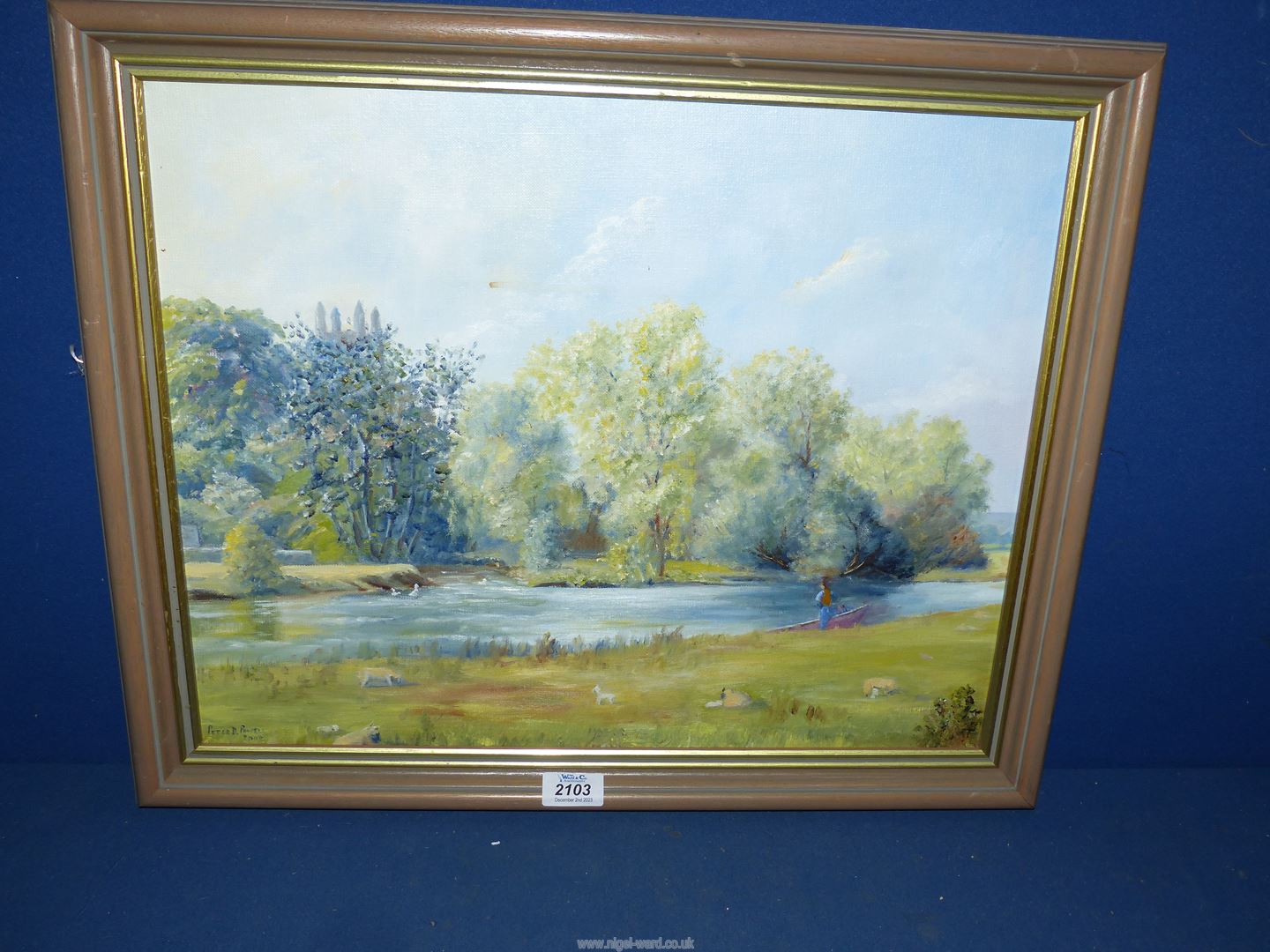 A framed Oil on canvas depicting a river scene with figures in a boat and ewes and lambs grazing,