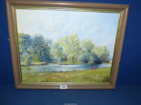A framed Oil on canvas depicting a river scene with figures in a boat and ewes and lambs grazing,
