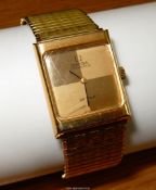 A yellow metal Omega Automatic Deville 24 jewel self-winding movement wristwatch also having an