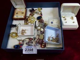 A quantity of earrings including studs, clip-on, silver, etc.