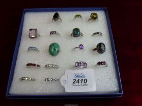 A quantity of mainly silver 925 marked rings containing a variety of coloured glass and stones.