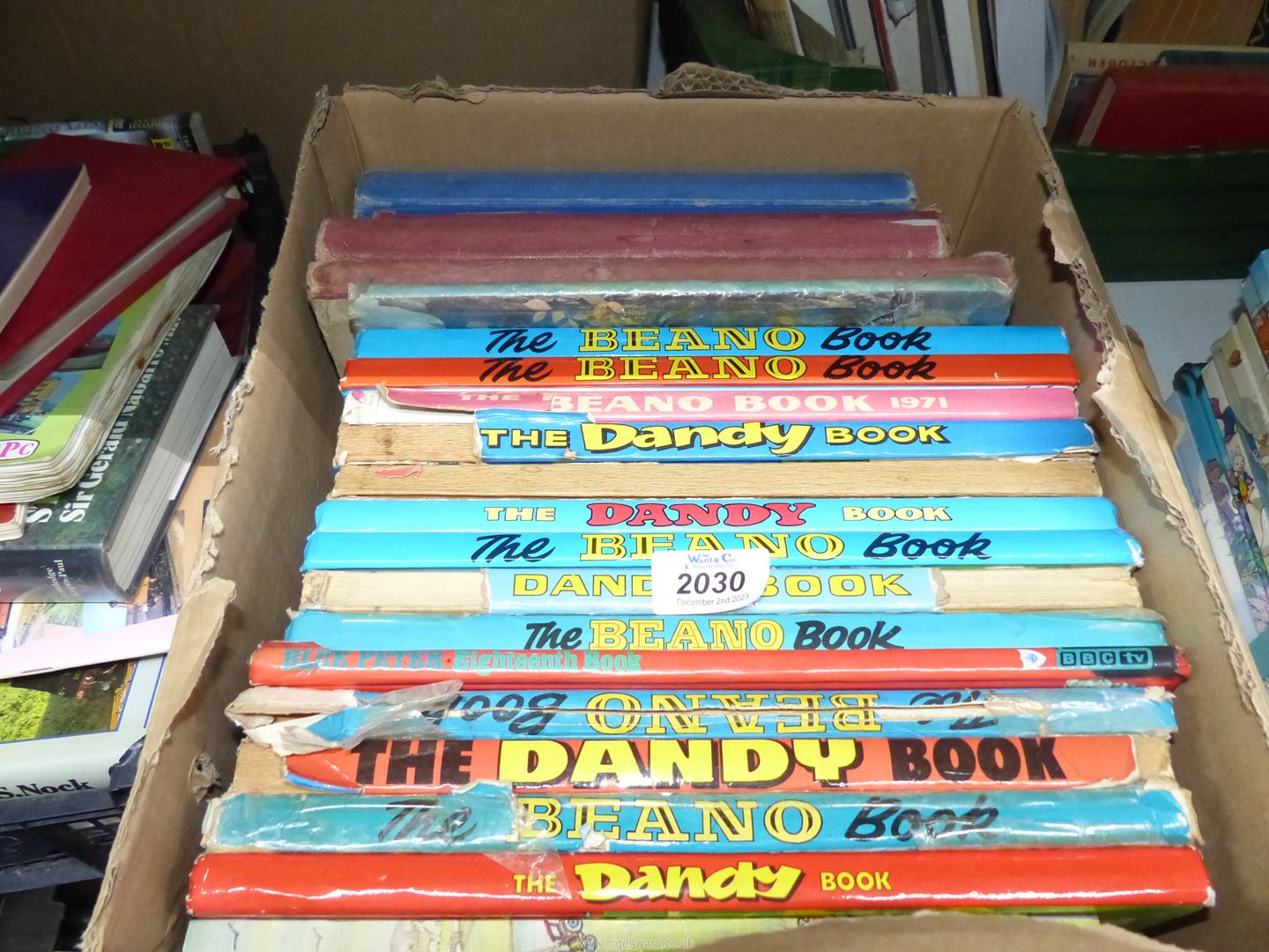 A quantity of children's annuals including Beano, Dandy, Rupert, Dick Barton, etc.