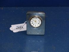 A small silver Quartz clock, London 2000, by Kitney & Co.
