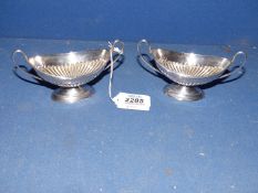 A pair of Silver boat shaped Salts of classical design, (mark not visible), G.F.