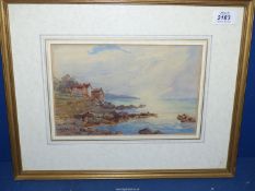 A framed and mounted watercolour of cottages on the coast by K.A Murray, 16 1/2'' x 13 1/4''.