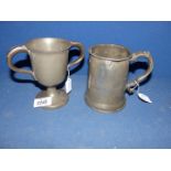A Victorian two handled Pewter Cup and an Edward VI pewter pint tankard, signed inside to the base.