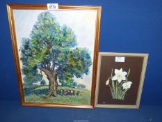 A framed Oil on canvas depicting cattle grazing under a tree,