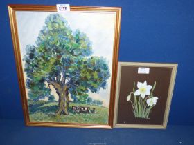 A framed Oil on canvas depicting cattle grazing under a tree,