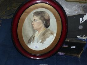 An oval Watercolour of a woman.