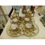 A fine hand painted French coffee set of tray, Marked H Prost, Charolles on base,