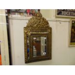 A gilt hall mirror,