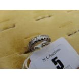 An 18ct White Gold baguette multi stone ring