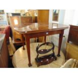 A Mahogany extending table