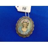 A Victorian White metal and hand painted portrait brooch
