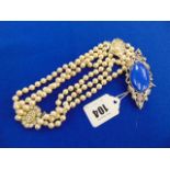 A hallmarked Silver clasp and Pearl necklace,