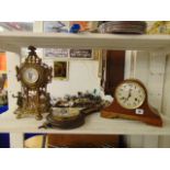 A brass decorative clock,