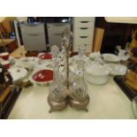 a 19th century silver plate and cut glass triple decanter stand