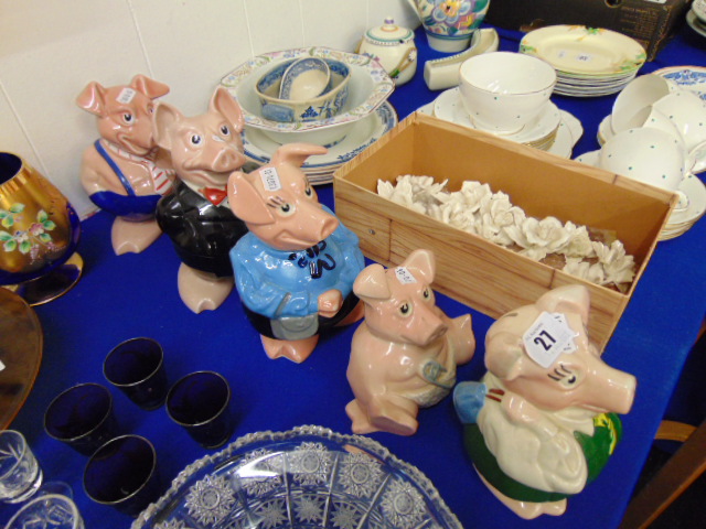 A family of Wade Natwest piggy banks,