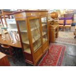 An Edwardian inlaid two door display cabinet