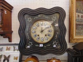 A 19th century carved and Mother of Pearl wall clock
