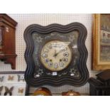 A 19th century carved and Mother of Pearl wall clock