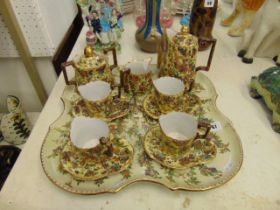 A fine hand painted French coffee set of tray, Marked H Prost, Charolles on base,