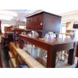 A wooden coffee table with small cabinet, wine rack etc.