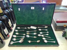 A qty of eighteen souvenir spoons in case,