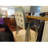 Four modern stacking chairs,