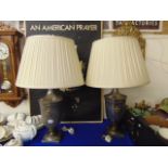 A pair of decorative lamps and shades