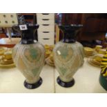 A pair of Royal Doulton Lambeth vases,