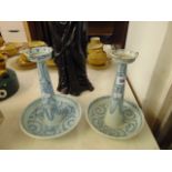 A pair of Chinese porcelain candle holders