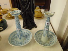 A pair of Chinese porcelain candle holders
