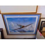 A framed print of a spitfire