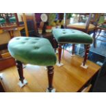 A pair of upholstered stools