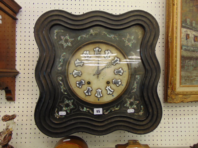 A 19th century carved and Mother of Pearl wall clock