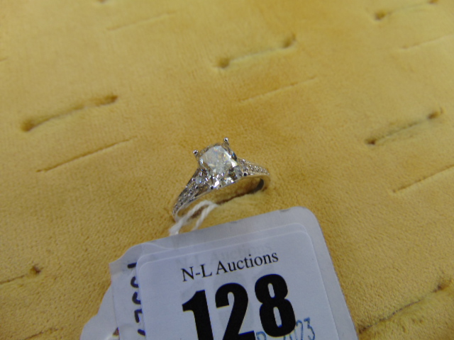 An 18ct White gold cushion cut Diamond ring, 1.