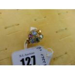 An 18ct GOld multi gem set and Diamond ring,