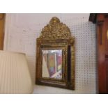 A gilt hall mirror,