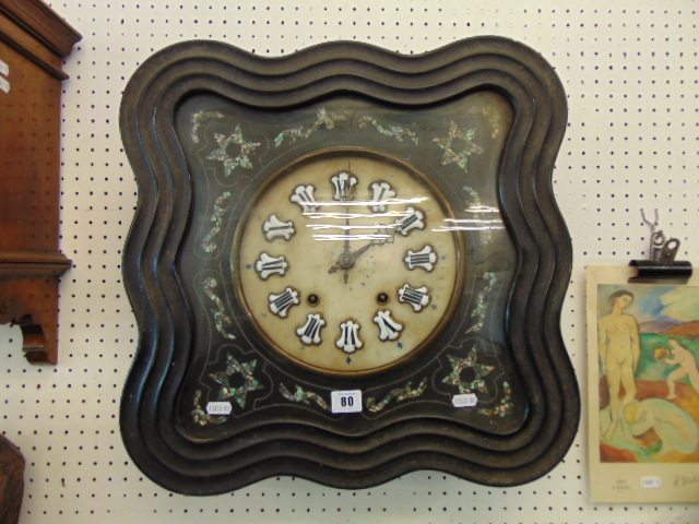 A 19th century carved and Mother of Pearl wall clock