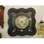 A 19th century carved and Mother of Pearl wall clock