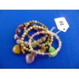 Four assorted elasticity gem set bracelets