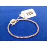 A White metal unmarked Diamond line bracelet,