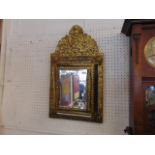 A gilt hall mirror,