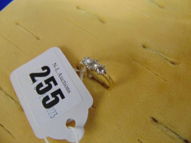 An 18ct Gold three stone Diamond ring