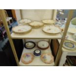 A qty of assorted plates