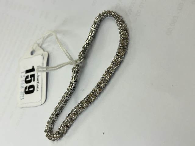 An 18ct White gold Diamond line bracelet, 140 Diamonds in total, - Image 11 of 11